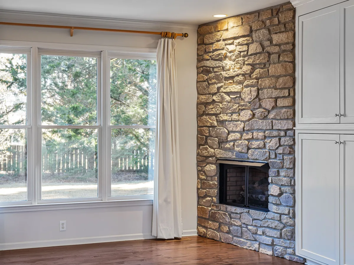 Living Room, before Fireplace Fire (Light an empty grate so a winter listing feels warm and lived-in.)