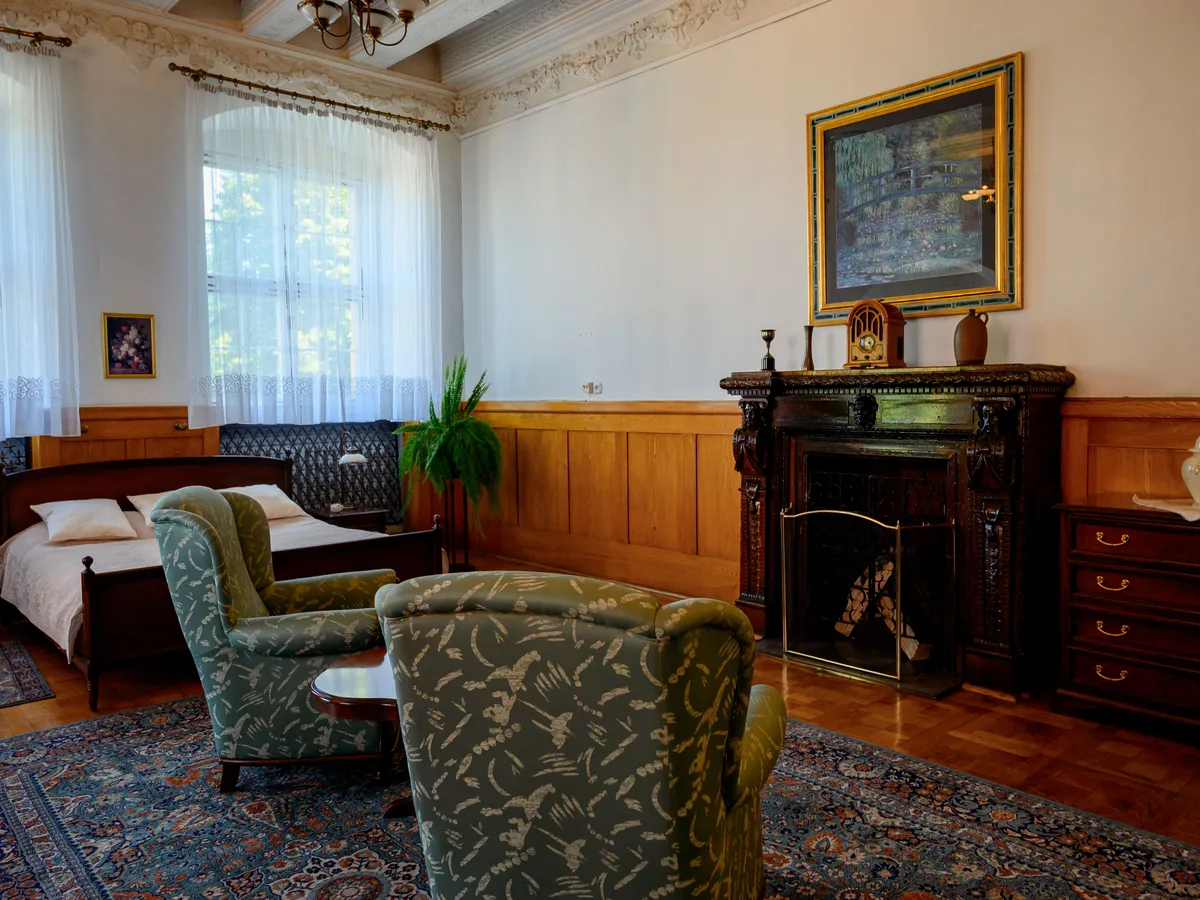 Primary Suite, before Fireplace Fire (Light an empty grate so a winter listing feels warm and lived-in.)